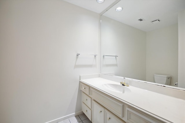 4107 Pebble Beach Dr, League City, TX 77573 - bathroom with tile patterned flooring, vanity, recessed lighting, baseboards, and toilet