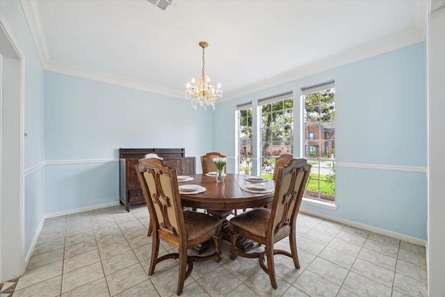 4107 Pebble Beach Dr, League City, TX 77573 - dining area with crown molding, a chandelier, baseboards, and light tile patterned flooring