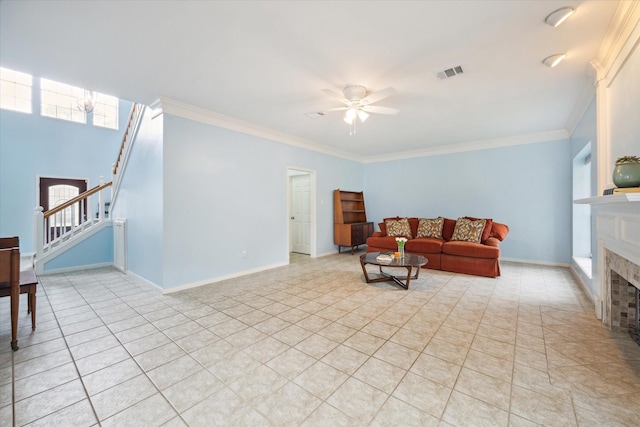 4107 Pebble Beach Dr, League City, TX 77573 - living area with stairway, a brick fireplace, ceiling fan, ornamental molding, and baseboards