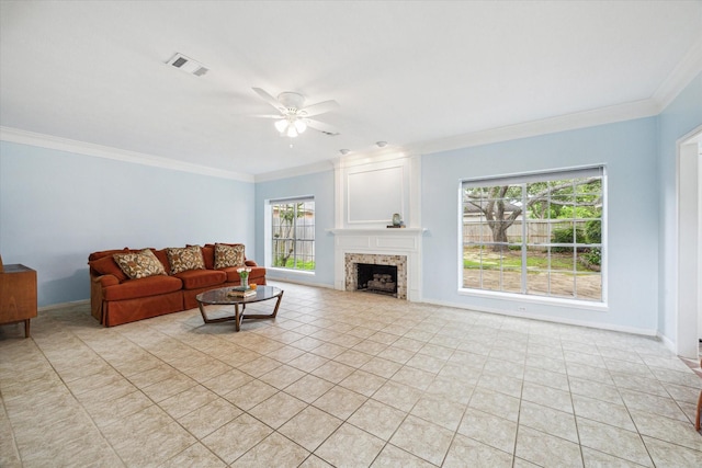 4107 Pebble Beach Dr, League City, TX 77573 - living room with crown molding, ceiling fan, light tile patterned floors, a fireplace, and baseboards