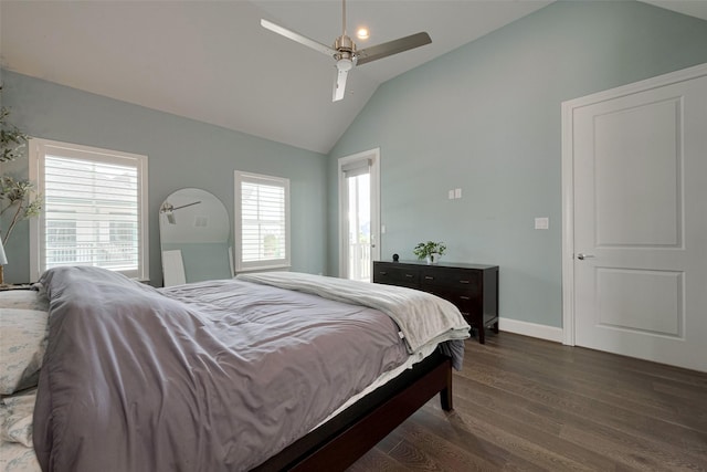 bedroom with baseboards, dark wood-style flooring, ceiling fan, and high vaulted ceiling