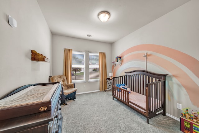 11430 Raven Claw Dr, Tomball, TX 77375 - carpeted bedroom featuring baseboards and a nursery area