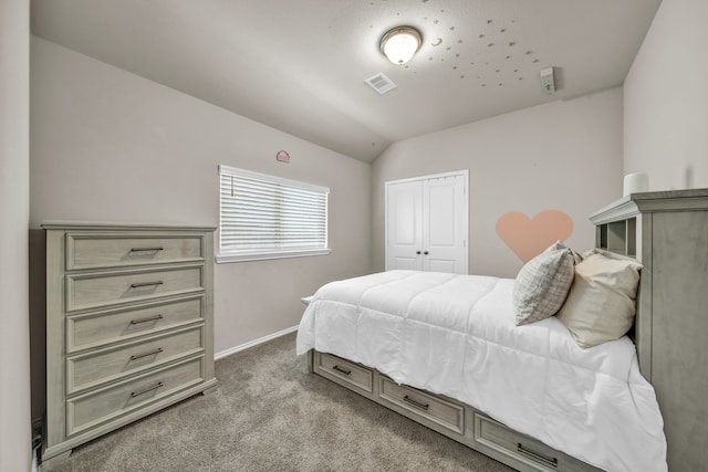11430 Raven Claw Dr, Tomball, TX 77375 - carpeted bedroom featuring baseboards, vaulted ceiling, and a closet