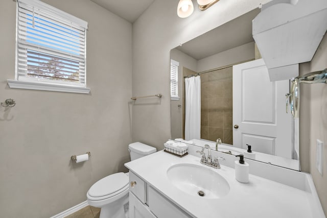 11430 Raven Claw Dr, Tomball, TX 77375 - full bath with plenty of natural light, toilet, vanity, and curtained shower