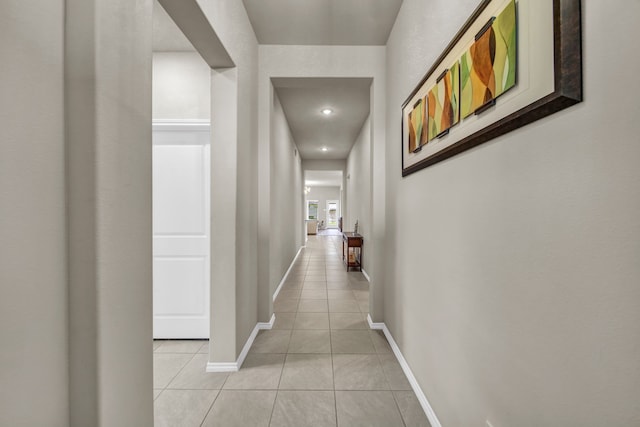 11430 Raven Claw Dr, Tomball, TX 77375 - corridor with light tile patterned flooring and baseboards