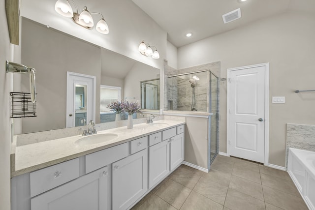 11430 Raven Claw Dr, Tomball, TX 77375 - full bathroom featuring a stall shower, a bath, double vanity, tile patterned flooring, and baseboards