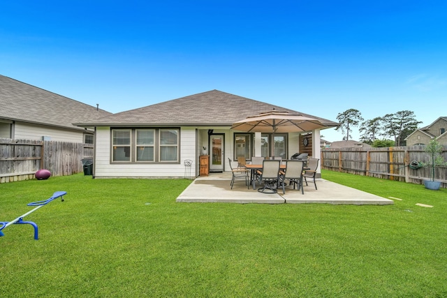 11430 Raven Claw Dr, Tomball, TX 77375 - back of house with a patio and roof with shingles