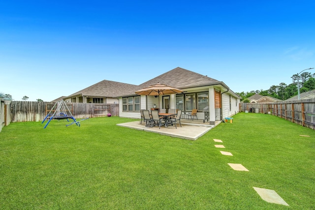 11430 Raven Claw Dr, Tomball, TX 77375 - back of property with a patio area and roof with shingles