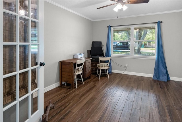 office featuring crown molding, baseboards, a ceiling fan, and wood finished floors