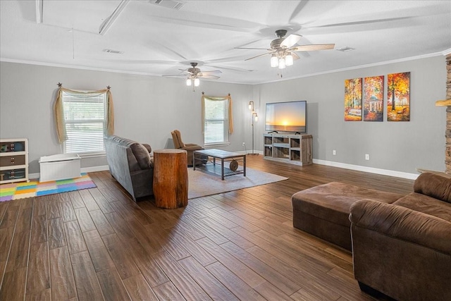 living room with dark wood finished floors, plenty of natural light, and attic access