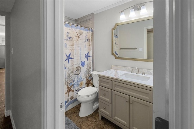 bathroom with vanity, a shower with shower curtain, and toilet