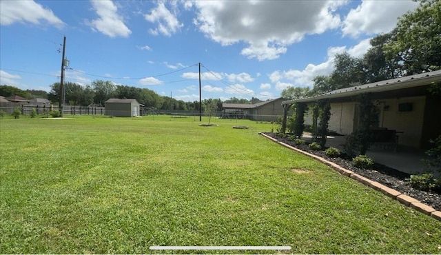 view of yard with a patio and fence