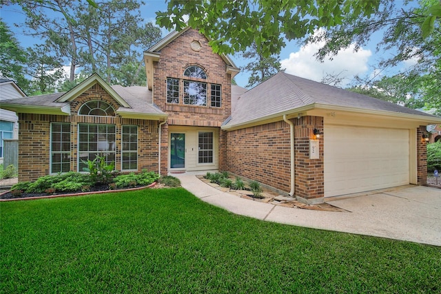 view of front of house featuring a front lawn, brick siding, a shingled roof, concrete driveway, and an attached garage