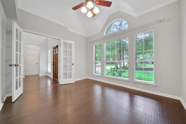 unfurnished room with french doors, ceiling fan, wood finished floors, and vaulted ceiling
