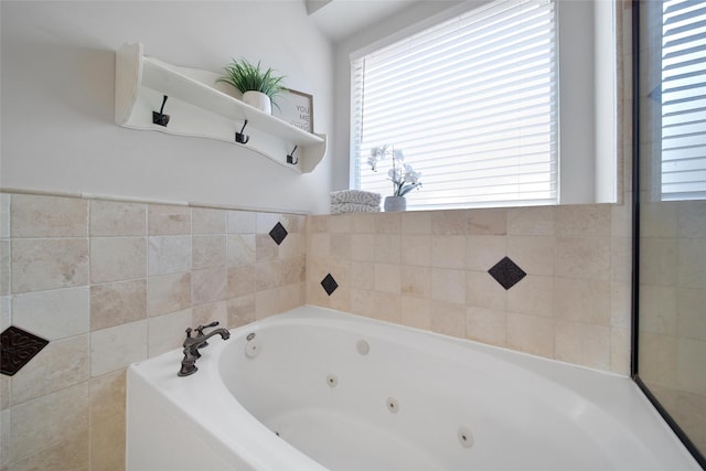 bathroom with a jetted tub