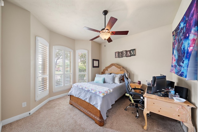 13105 Parc Cove Ct, Cypress, TX 77429 - bedroom featuring carpet flooring, baseboards, an office area, and a ceiling fan