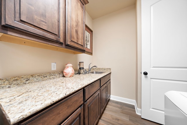 13105 Parc Cove Ct, Cypress, TX 77429 - bathroom with wood finished floors, baseboards, vanity, and toilet