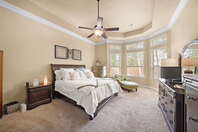 13105 Parc Cove Ct, Cypress, TX 77429 - carpeted bedroom featuring a raised ceiling, ornamental molding, a ceiling fan, and baseboards