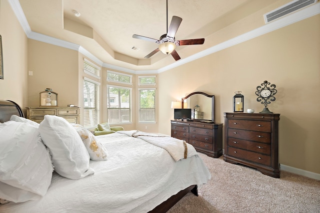 13105 Parc Cove Ct, Cypress, TX 77429 - bedroom featuring a tray ceiling, carpet floors, ornamental molding, ceiling fan, and baseboards
