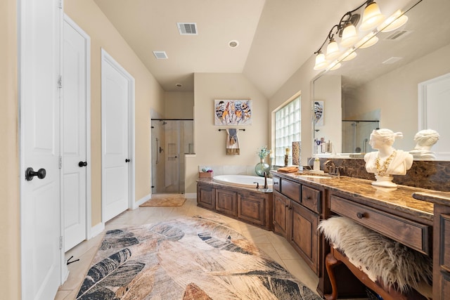 13105 Parc Cove Ct, Cypress, TX 77429 - full bath featuring a shower stall, a garden tub, vanity, vaulted ceiling, and baseboards