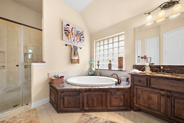 13105 Parc Cove Ct, Cypress, TX 77429 - full bathroom featuring a shower stall, a garden tub, vaulted ceiling, vanity, and tile patterned flooring