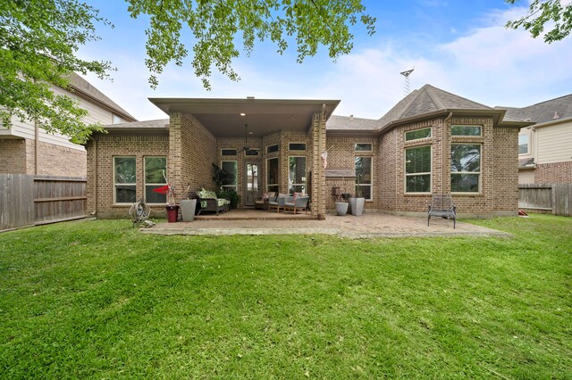 13105 Parc Cove Ct, Cypress, TX 77429 - back of house featuring a patio and brick siding