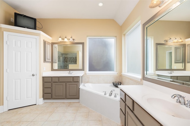 2010 Cias Trail Ln, Spring, TX 77386 - bathroom with tile patterned flooring, a shower stall, a sink, and a garden tub