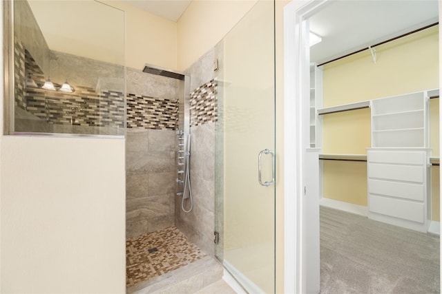 2010 Cias Trail Ln, Spring, TX 77386 - bathroom with a walk in closet and a stall shower