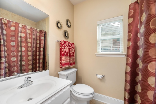 2010 Cias Trail Ln, Spring, TX 77386 - bathroom featuring vanity, baseboards, toilet, and a shower with shower curtain