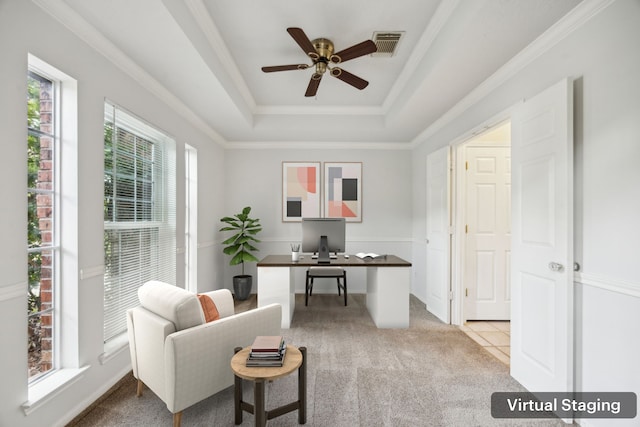 23026 Eastgate Village Dr, Spring, TX 77373 - home office with crown molding, ceiling fan, light colored carpet, a tray ceiling, and visible vents