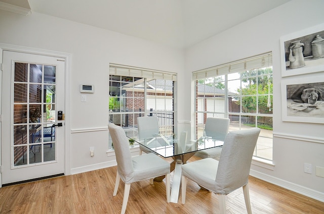 51 Asbury Park Ct, Sugar Land, TX 77479 - dining space with baseboards and wood finished floors
