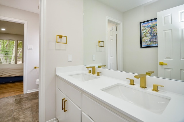 51 Asbury Park Ct, Sugar Land, TX 77479 - bathroom with a sink, toilet, ensuite bath, and double vanity