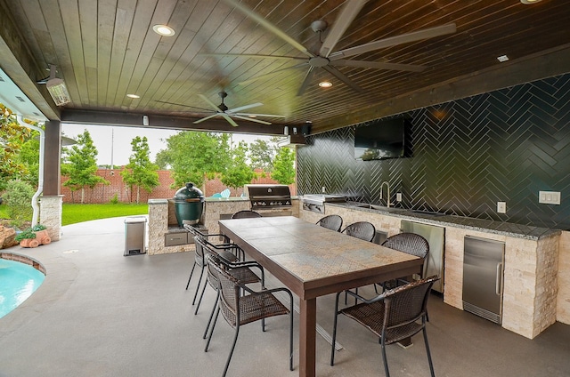 51 Asbury Park Ct, Sugar Land, TX 77479 - view of patio / terrace featuring fence, grilling area, area for grilling, outdoor dining area, and a ceiling fan