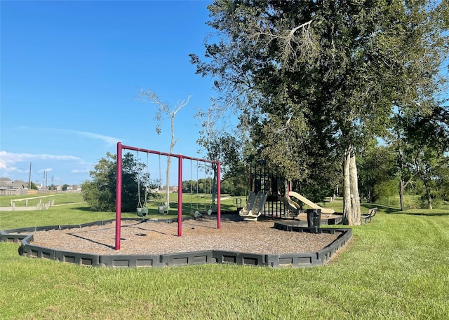 community jungle gym featuring a yard