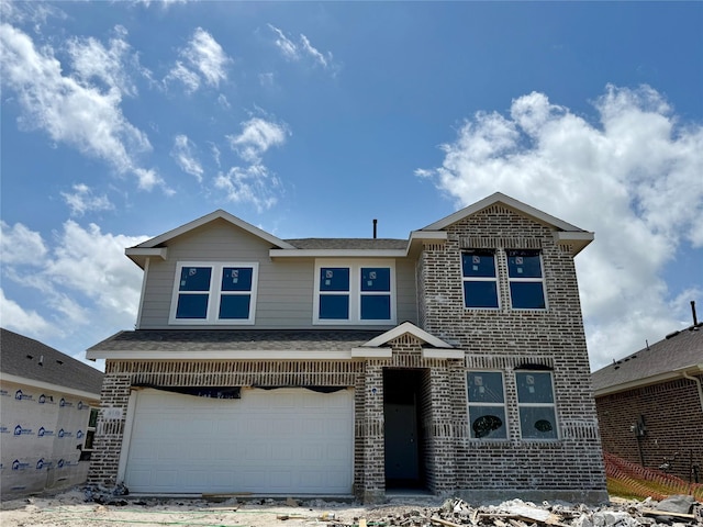 8339 Bay Oaks Dr, Baytown, TX 77523 - view of front of home with a garage, brick siding, and roof with shingles