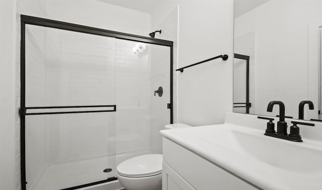 8339 Bay Oaks Dr, Baytown, TX 77523 - full bathroom featuring vanity, toilet, and a shower stall