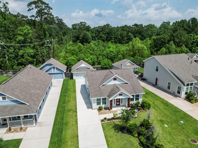 222 N Lynx Trl, Montgomery, TX 77316 - drone / aerial view featuring a wooded view