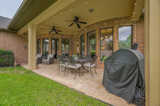 view of patio / terrace with a ceiling fan and a grill