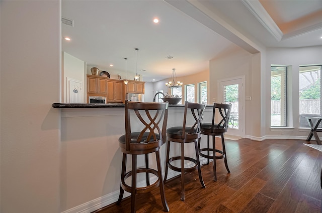 kitchen with stainless steel appliances, recessed lighting, and dark wood-style floors