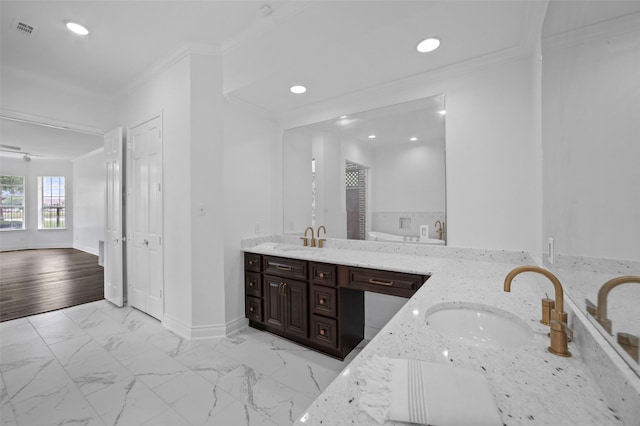 803 Mahogany Run Dr, Katy, TX 77494 - bathroom with ornamental molding, double vanity, recessed lighting, baseboards, and marble finish flooring