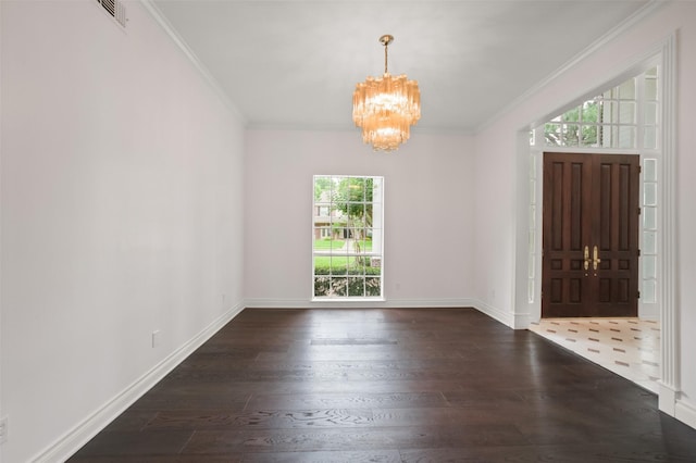 803 Mahogany Run Dr, Katy, TX 77494 - entrance foyer featuring a chandelier, plenty of natural light, wood finished floors, crown molding, and baseboards