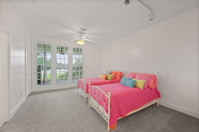 803 Mahogany Run Dr, Katy, TX 77494 - bedroom featuring carpet floors, a ceiling fan, baseboards, and access to exterior