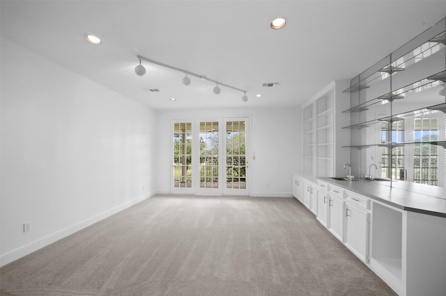 803 Mahogany Run Dr, Katy, TX 77494 - unfurnished room featuring baseboards, healthy amount of natural light, light colored carpet, recessed lighting, and track lighting