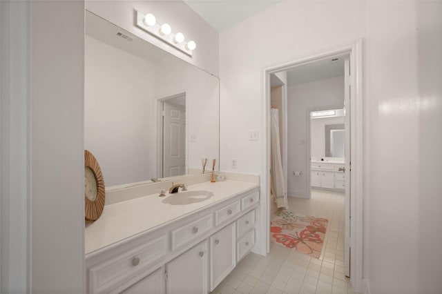 803 Mahogany Run Dr, Katy, TX 77494 - bathroom with tile patterned floors and vanity