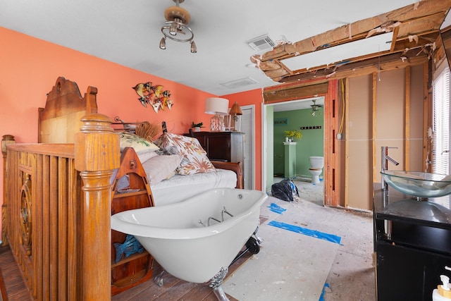 13114 Coronado Dr, Freeport, TX 77541 - interior space with visible vents, a sink, and ensuite bath