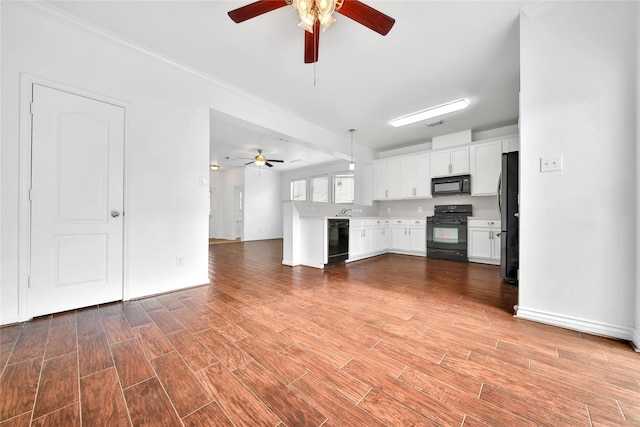 13003 Brutus Hill Ln, Houston, TX 77072 - unfurnished living room with baseboards, a ceiling fan, and light wood finished floors