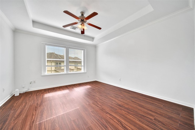 13003 Brutus Hill Ln, Houston, TX 77072 - spare room featuring visible vents, crown molding, wood finished floors, ceiling fan, and a raised ceiling