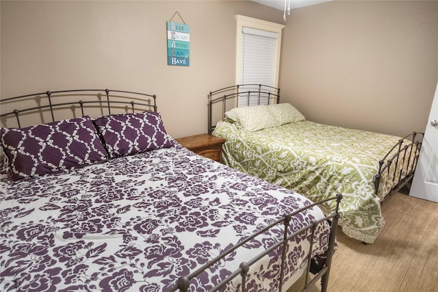 bedroom featuring carpet floors