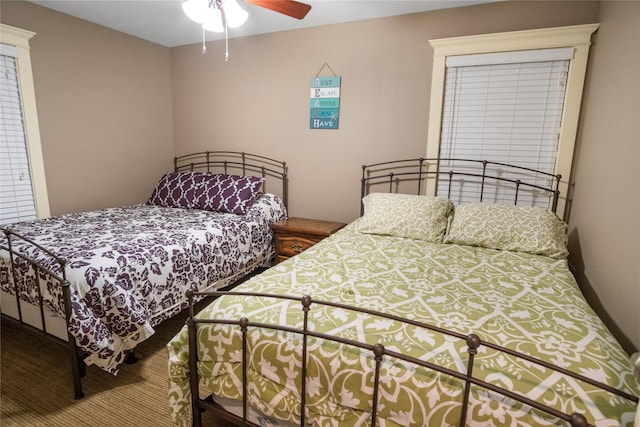 bedroom with carpet flooring and ceiling fan