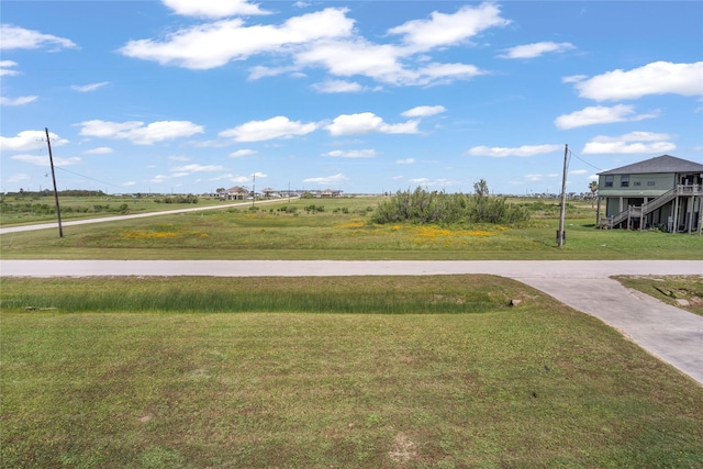 surrounding community with a lawn